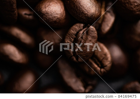 Coffee beans background, roasted signature bean with rich flavour, best morning drink and luxury blend 84169475
