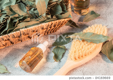 Cosmetology and personal care. Infusion decoction of bay leaf essential oil in a bottle, natural antiseptic, antioxidant, acne remedy, macronutrients for skin and hair. Herbal medicine Cosmetology and personal care. Infusion decoction of bay leaf essential oil in a bottle, natural antiseptic, antioxidant, acne remedy, macronutrients for skin and hair. Herbal medicine 84169669