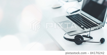 Headset and customer support equipment at call center ready for actively service Headset and customer support equipment at call center ready for actively service 84170242