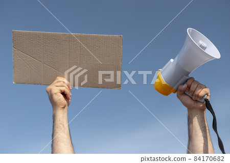 activists marching together with megaphone. High quality beautiful photo concept activists marching together with megaphone. High quality beautiful photo concept 84170682