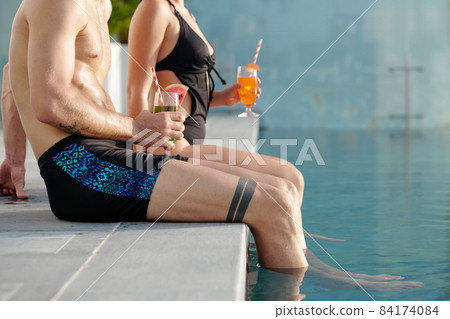 Couple with Sweet Frutty Drinks Couple with Sweet Frutty Drinks 84174084
