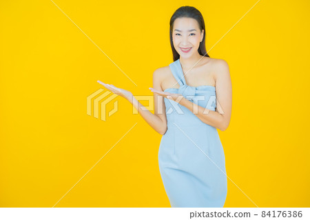 Portrait beautiful young asian woman smile with action Portrait beautiful young asian woman smile with action 84176386