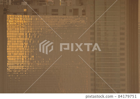 building with many windows on the facade. patter from windows 13 Nov 2021 84179751