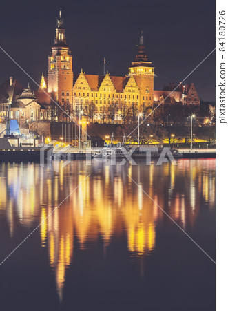 Szczecin waterfront with Chrobry Embankment at night, color toning applied, Poland. 84180726