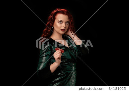 Young beautiful woman with chips in her hands over black. Casino Young beautiful woman with chips in her hands over black. Casino 84181025