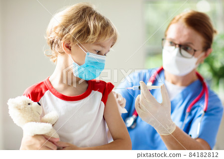 Child covid-19 vaccine. Coronavirus vaccination. 84182812