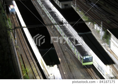 Yamanote Line arriving at Tabata Station near the last train 84187175