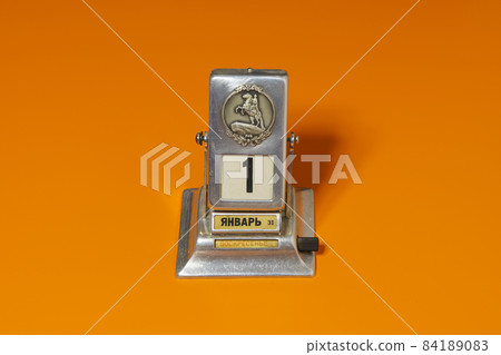 Retro manual desk calendar with date of 1 January the first day of new year Retro manual desk calendar with date of 1 January the first day of new year 84189083