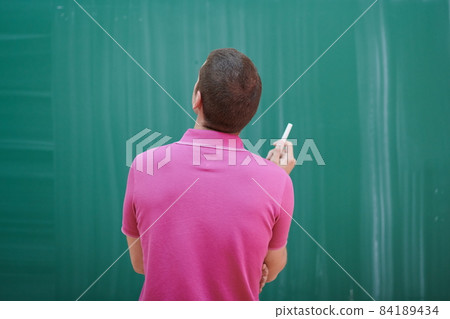 the student does the task on the board 84189434