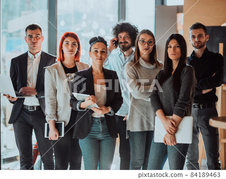 Group of successful business people standing together at office. 84189463