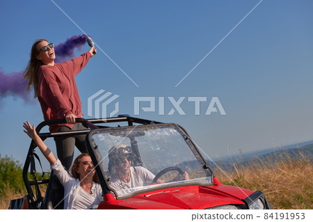 colorful torches while driving a off road buggy car colorful torches while driving a off road buggy car 84191953