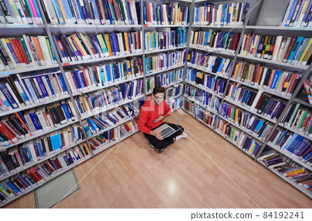 the students uses a notebook, laptop and a school library the students uses a notebook, laptop and a school library 84192241