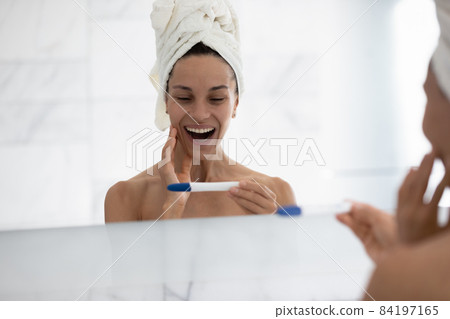 Joyful millennial hispanic getting pregnancy confirmation. Joyful millennial hispanic getting pregnancy confirmation. 84197165