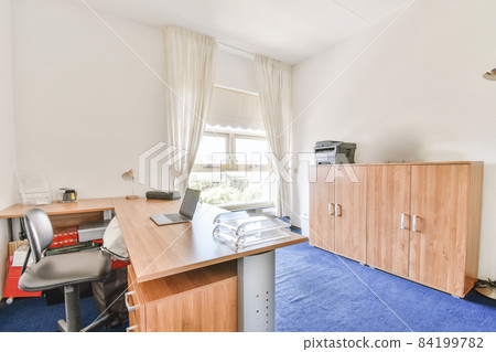 Design of the stylish cozy office room Design of the stylish cozy office room 84199782