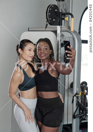 Sportswomen Taking Photot for Social Media Sportswomen Taking Photot for Social Media 84201448