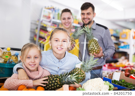 family of four with pineapples family of four with pineapples 84201750