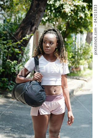 Black Young Woman with Gym Bag 84201833