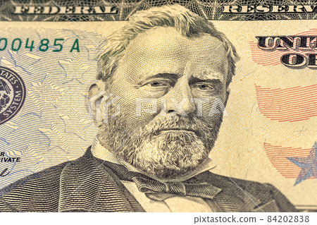 Close-up of 50 us dollar bill. Portrait of President and General Ulysses Grant on the US fifty us dollars banknote. Close-up of 50 us dollar bill. Portrait of President and General Ulysses Grant on the US fifty us dollars banknote. 84202838