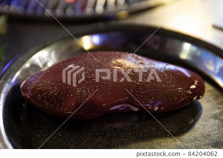 Grilled pork kidneys on charcoal fire, Korean traditional food Grilled pork kidneys on charcoal fire, Korean traditional food 84204062