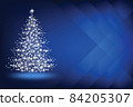Abstract Christmas tree made of snowflakes and sparks on a blue blank background 84205307