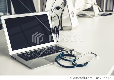 Headset and doctor equipment at clinic ready for actively support for patient Headset and doctor equipment at clinic ready for actively support for patient 84206542