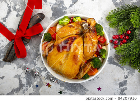 Roast chicken with lemons and spice for Christmas Roast chicken with lemons and spice for Christmas 84207910