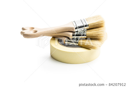 Set of clean paint brushes and paper tape Set of clean paint brushes and paper tape 84207912