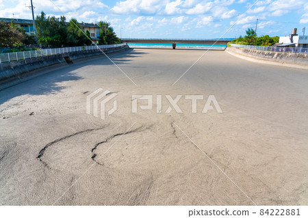 Pumice stones that fill the river in Okinawa 84222881