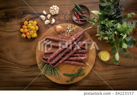 polish kabanos sausages on rustic wood table with natural ingredients 84223157