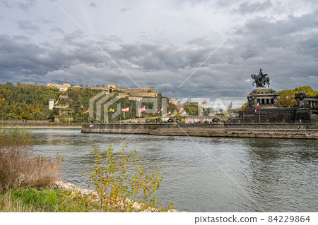Koblenz were Rhein and Mosel meet. In the foreground the German Corner, a symbol of the unification of Germany with an statue of Emperor William I. In the background the fortress Ehrenbreitstein Koblenz were Rhein and Mosel meet. In the foreground the German Corner, a symbol of the unification of Germany with an statue of Emperor William I. In the background the fortress Ehrenbreitstein 84229864