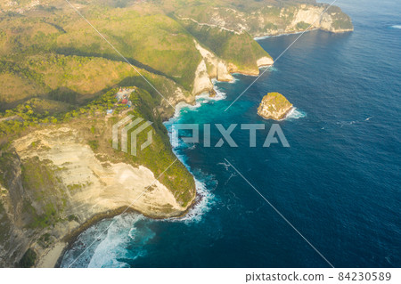 Aerial view on tropical coast Kelingking Beach with turquoise sea in Nusa Penida island, Bali 84230589