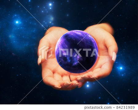 Planet in female hands - abstract background of esoteric themes 84231989
