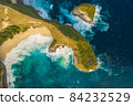 Aerial view on tropical coast Kelingking Beach with turquoise sea in Nusa Penida island, Bali 84232529