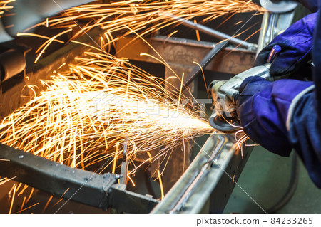 grinding machine on work and spark movement 84233265