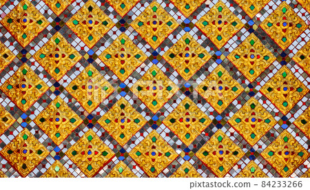 The motifs wall of the temple Thailand 84233266