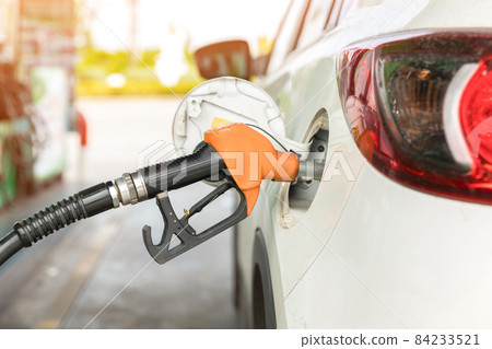 Refill and filling Oil Gas Fuel at station. Gas station - refueling. 84233521