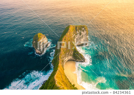 Aerial view on tropical coast Kelingking Beach with turquoise sea in Nusa Penida island, Bali 84234361