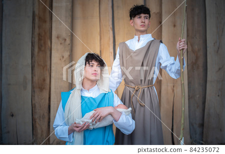 Nativity scene represented by androgynous people with staring gaze 84235072