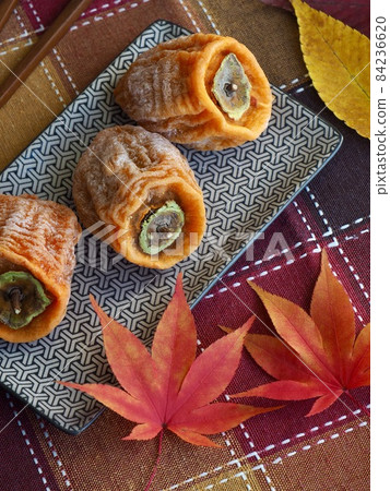 Korean traditional food Dried persimmon and maple leaves 84236620