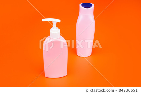 Plastic cosmetic packing with flip cap and pump dispenser for shampoo and liquid soap, bottles 84236651