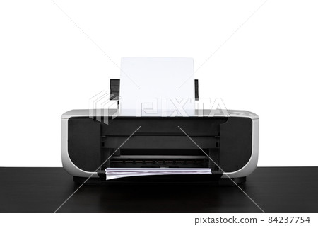 Laser home printer on table against white backgorund 84237754