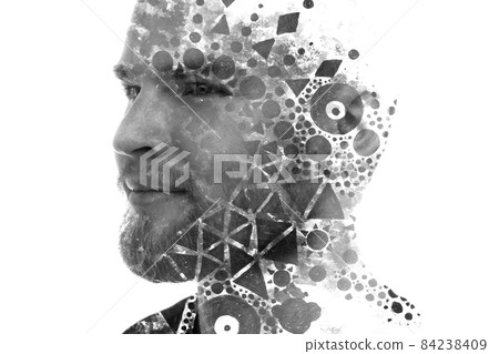 A double exposure portrait of a man combined with abstract geometric shapes. 84238409