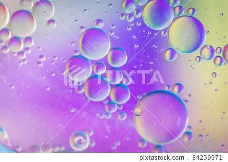 Defocused multicolored abstract background picture made with oil, water and soap Defocused multicolored abstract background picture made with oil, water and soap 84239971