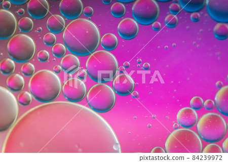 Purple defocused abstract background picture made with oil, water and soap Purple defocused abstract background picture made with oil, water and soap 84239972