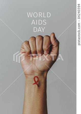 red ribbon and text world aids day 84240394