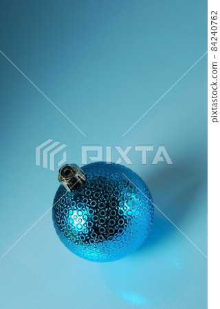 christmass ball on a blue background 84240762