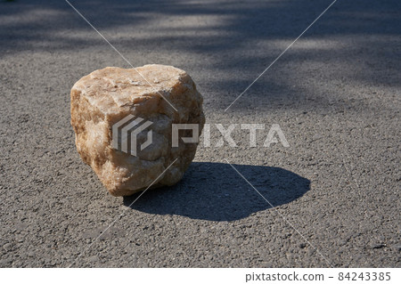 The concept of a summer layout for a product presentation. The platform is made of beige stone on the asphalt. High quality photo 84243385