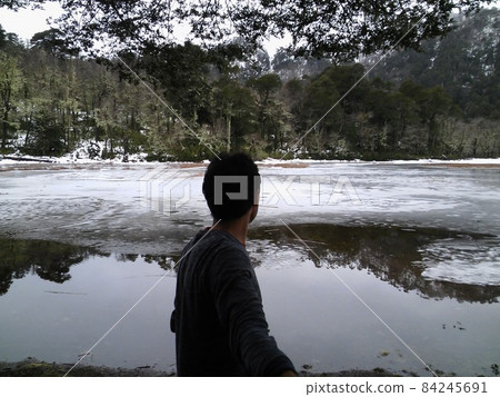 Frozen lake on the mountain at Reserva El Cani, Pucon, Chile, during the winter Frozen lake on the mountain at Reserva El Cani, Pucon, Chile, during the winter 84245691