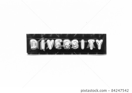 Embossed letter with word diversity in black banner on white paper background Embossed letter with word diversity in black banner on white paper background 84247542