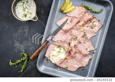 Traditional lunch meat with sliced cold cuts roast beef and remoulade Traditional lunch meat with sliced cold cuts roast beef and remoulade 84249318